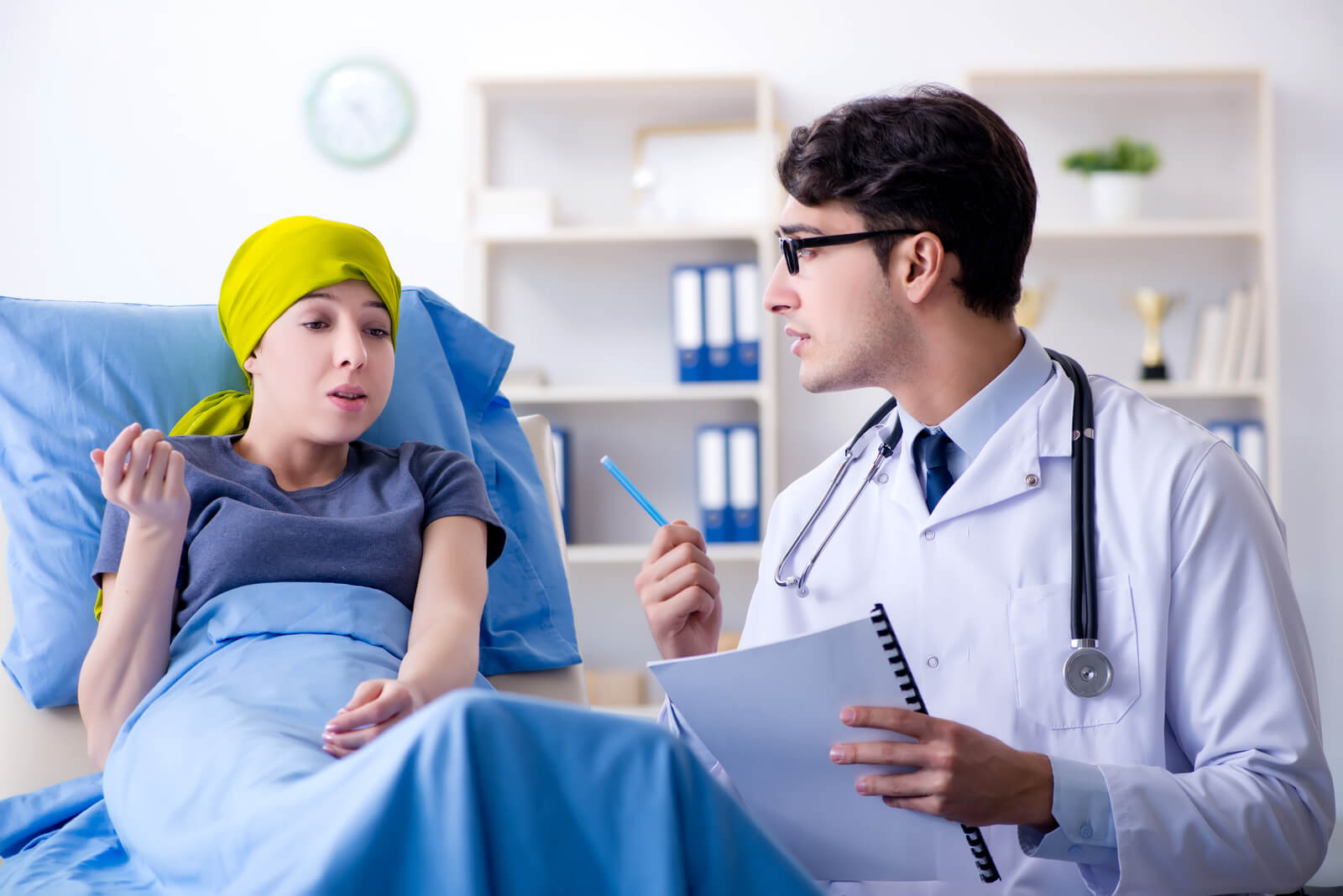 A medical doctor talking with a cancer patient.