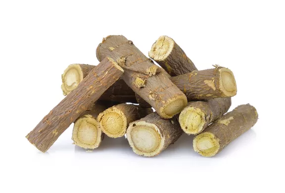 licorice root on white background